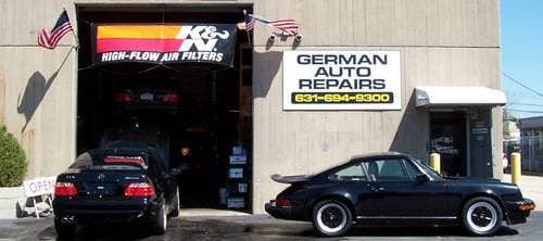 German Auto Repairs storefront on Allen Blvd with a Porsche 911 parked outside